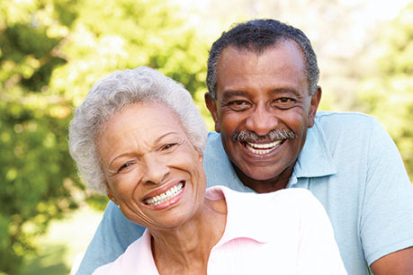 Photo of a man and woman smiling Photo of a man and woman smiling