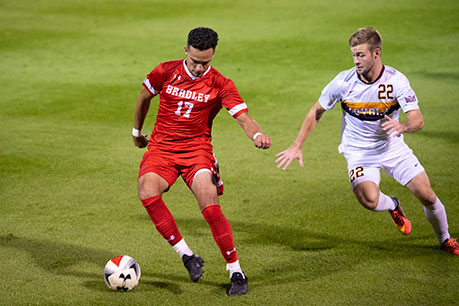 Athletes playing soccer. Links to Gifts That Protect Your Assets