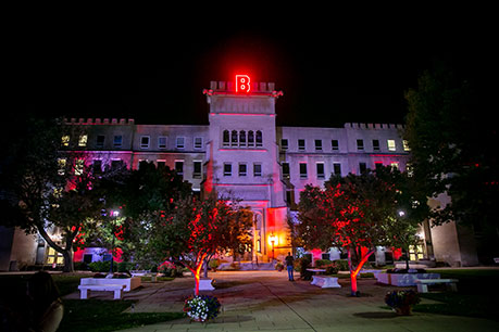 Photo of campus building. Links to Norm and Nellie Porch story