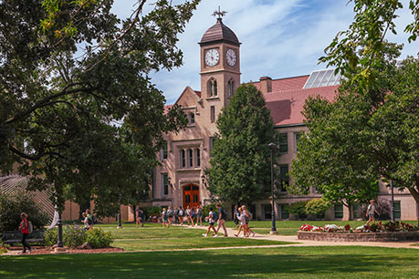 Photo of campus building. Links to Allan and Lorie Bartel story